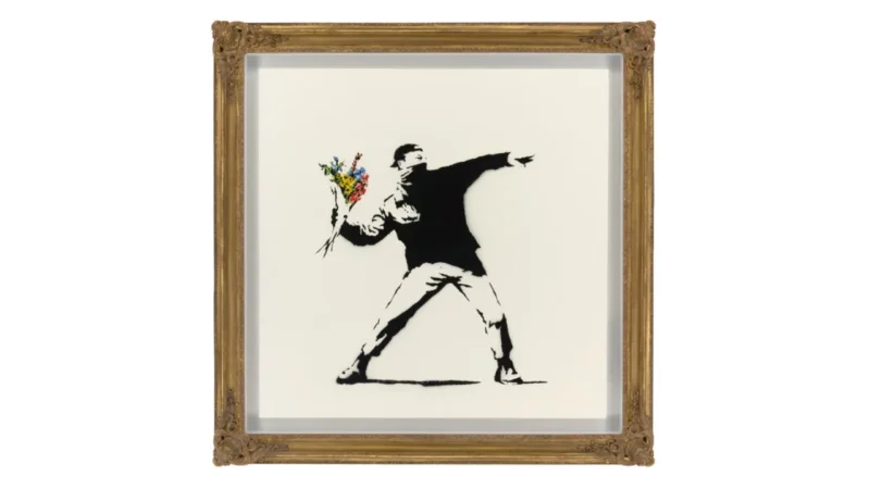 "Love Is in The Air" paining. Source: Banksy.
