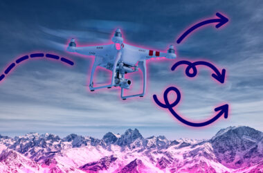 A drone flies over snowy mountains, and glows pink. The drone’s previous path is marked with a dotted line. There are 3 possible trajectories for the drone to take going forward, represented by lines.