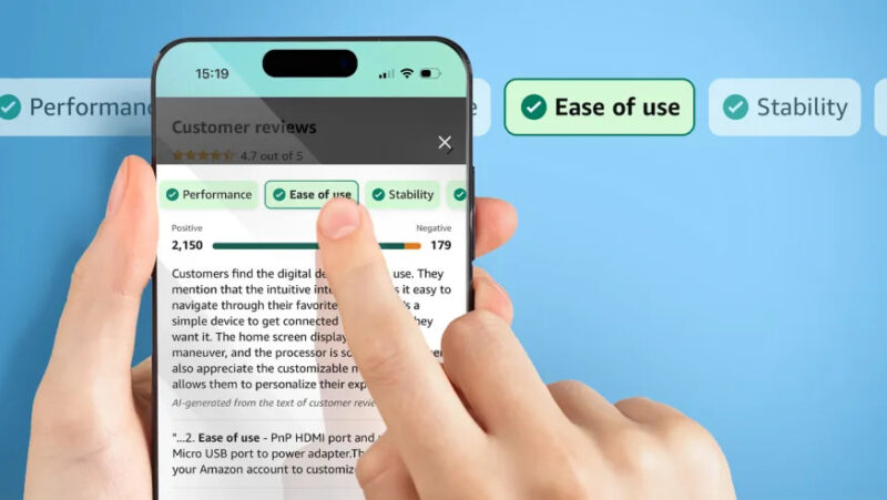 Amazon marketing image for its new AI-powered review summaries. In front of a blue background, a hand taps on an "Ease of use" tag generated in a summary. Tags float in the background behind the phone, illustrating its supposed ease of use.